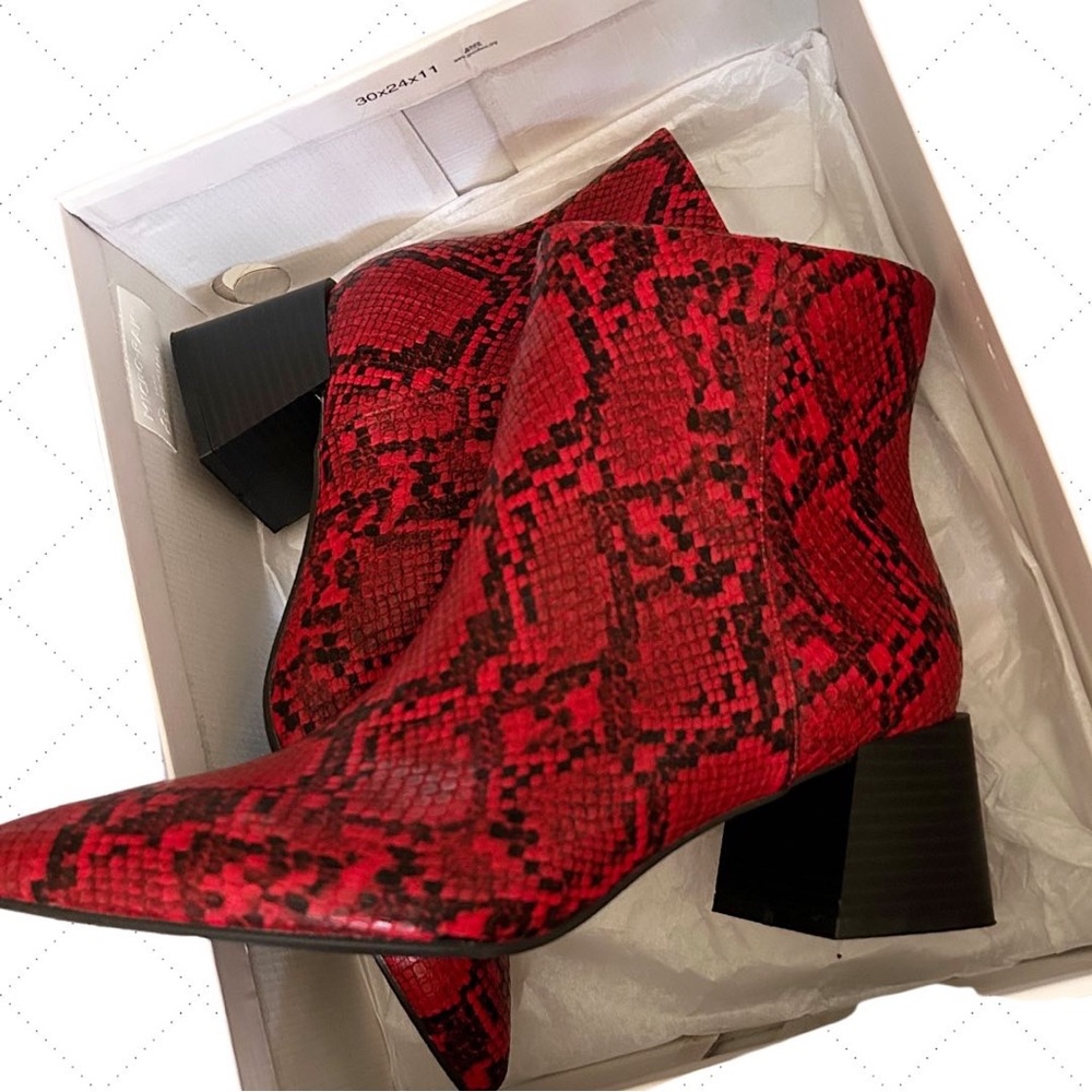 Red snakeskin ankle boots